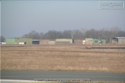 The runway with buildings and hangars