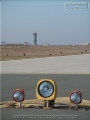 The runway with buildings and hangars