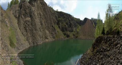 Steinbruchsee des abgerissenen Basaltwerks Stangenroth